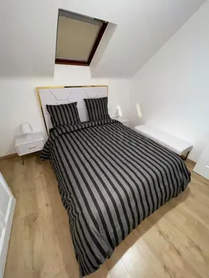 Un ou plusieurs lits dans un hébergement de l'établissement Luxury suite maladiere 2