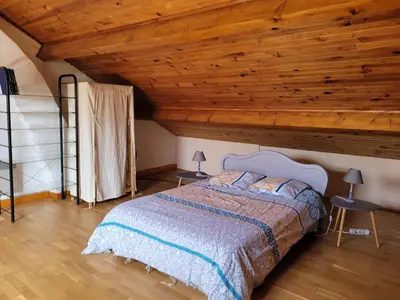 Un ou plusieurs lits dans un hébergement de l'établissement LA PETITE MAISON