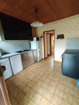 Cuisine ou kitchenette dans l'établissement Les Chaumes