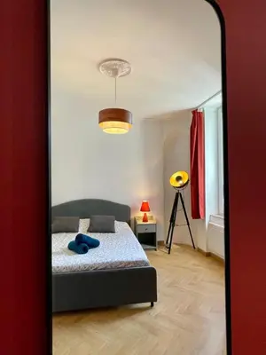 Un ou plusieurs lits dans un hébergement de l'établissement LE CLOS DE SAINT JO - Dijon centre T3