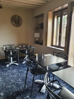 Coin salon dans l'établissement Delfotel