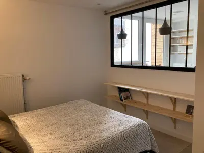 Un ou plusieurs lits dans un hébergement de l'établissement Appart' Au Coeur de Nuits