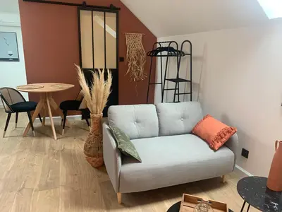 Coin salon dans l'établissement Le studio d’Ambre