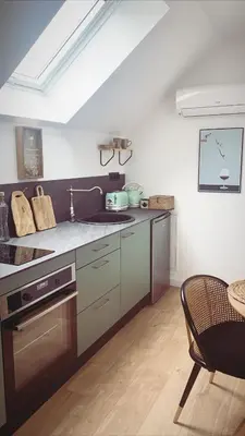 Cuisine ou kitchenette dans l'établissement Le studio d’Ambre