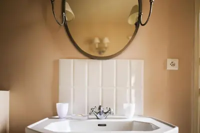 Salle de bains dans l'établissement Château Armand Heitz - Domaine Armand Heitz