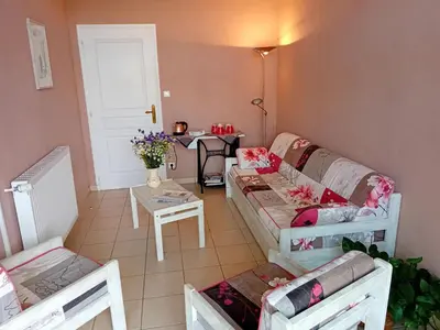 Coin salon dans l'établissement Ferme du Pigeonnier