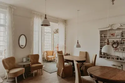 Coin salon dans l'établissement Wohnung für 12 Personen mit 6 Bädern