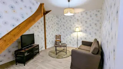 Télévision ou salle de divertissement dans l'établissement Maison Picard