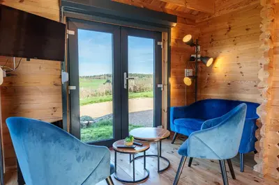 Coin salon dans l'établissement Le Chalet du Crescent