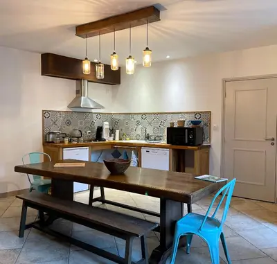 Cuisine ou kitchenette dans l'établissement Chambre d'Aut'