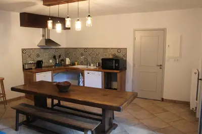 Cuisine ou kitchenette dans l'établissement Chambre d'Aut'