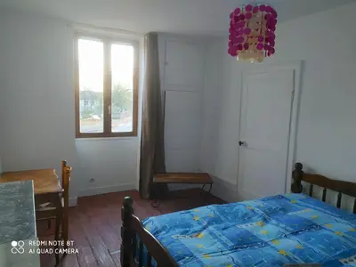 Un ou plusieurs lits dans un hébergement de l'établissement Appartement Hibou