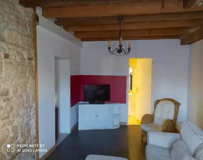 Télévision ou salle de divertissement dans l'établissement Appartement Hibou