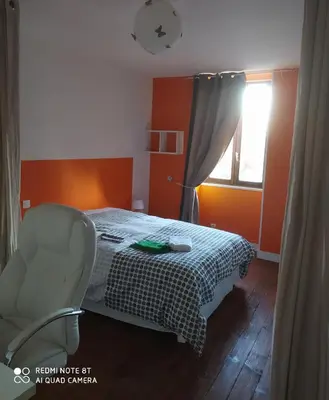 Un ou plusieurs lits dans un hébergement de l'établissement Appartement Hibou