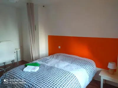 Un ou plusieurs lits dans un hébergement de l'établissement Appartement Hibou