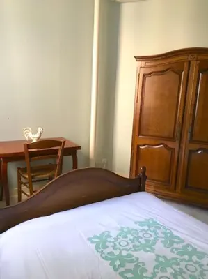 Un ou plusieurs lits dans un hébergement de l'établissement Appartement Grand-duc