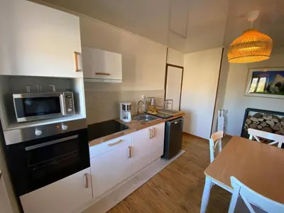 Cuisine ou kitchenette dans l'établissement Un cocon en plein coeur du Jura