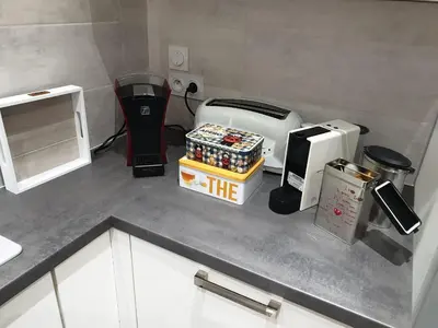 Cuisine ou kitchenette dans l'établissement Appartement COSY et chaleureux