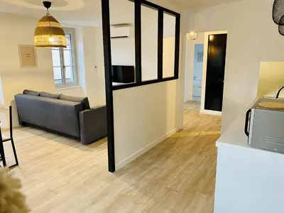 Coin salon dans l'établissement Suite 24 Appart'hôtel-L'Annexe-3 étoiles