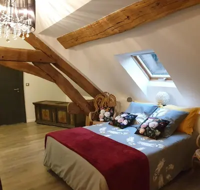 Un ou plusieurs lits dans un hébergement de l'établissement Maison Bélénos