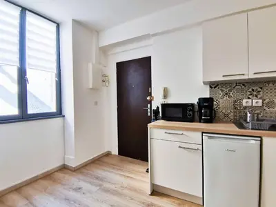 Cuisine ou kitchenette dans l'établissement Appartement calme en hypercentre