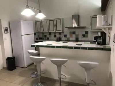 Cuisine ou kitchenette dans l'établissement Le Tâcheron