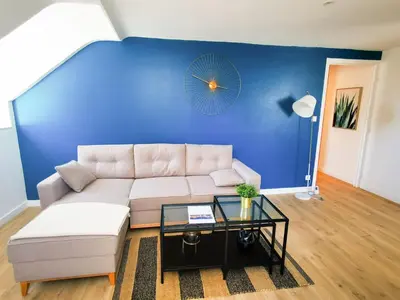 Coin salon dans l'établissement Appartement Cosy en Hypercentre - Le Petit Jules