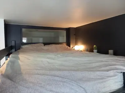 Un ou plusieurs lits dans un hébergement de l'établissement Studio avec terrasse en résidence calme à Dijon.