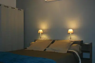 Un ou plusieurs lits dans un hébergement de l'établissement Gîte Le Balthazar