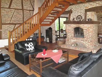 Coin salon dans l'établissement Holiday Home Alexandre by Interhome