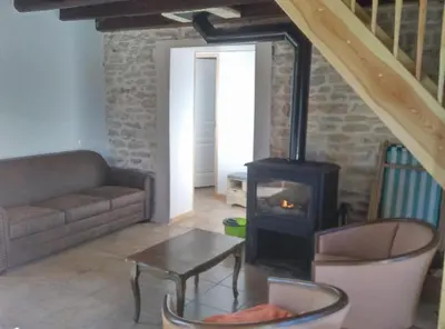 Coin salon dans l'établissement Charmant gîte Bourguignon