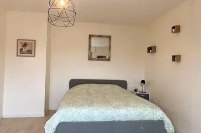 Un ou plusieurs lits dans un hébergement de l'établissement Le Tivoli - Balcon Vue jardin