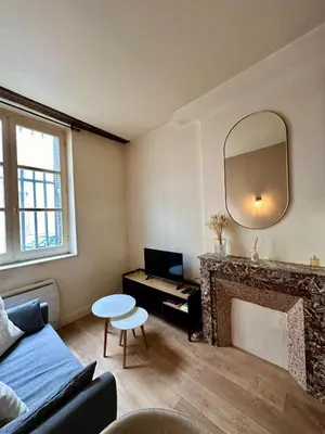 Coin salon dans l'établissement Le Charmant Vannerie