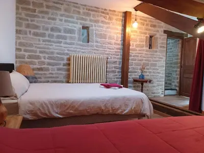 Un ou plusieurs lits dans un hébergement de l'établissement 2 chambres au calme à la Maison des Bambous