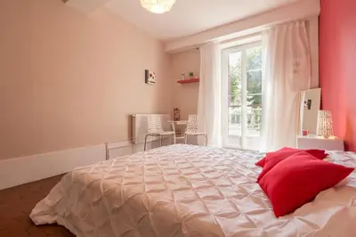 Un ou plusieurs lits dans un hébergement de l'établissement Les Hortensias