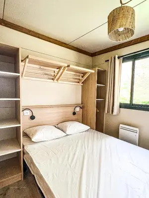 Un ou plusieurs lits dans un hébergement de l'établissement Camping Onlycamp le Champ d'été