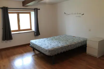 Un ou plusieurs lits dans un hébergement de l'établissement Maison champêtre au coeur de la campagne