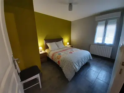Un ou plusieurs lits dans un hébergement de l'établissement Gîte Les Grands Prés