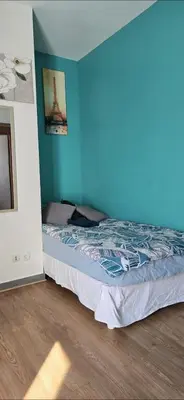 Un ou plusieurs lits dans un hébergement de l'établissement Studio de 12m² agréable calme proche CHU