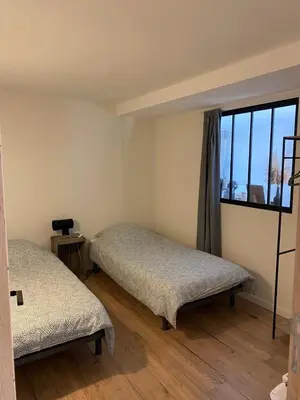 Un ou plusieurs lits dans un hébergement de l'établissement Appartement 3 étoiles tout confort et spacieux en campagne bourguignonne