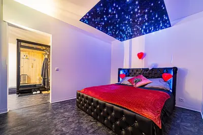 Un ou plusieurs lits dans un hébergement de l'établissement superbe appartement de charme moulin de Baverans .