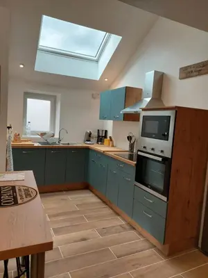 Cuisine ou kitchenette dans l'établissement Le gîte du Chat Perché