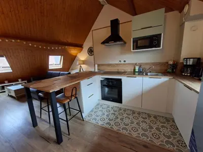 Cuisine ou kitchenette dans l'établissement Duplex au centre ville, dans cour intérieure calme