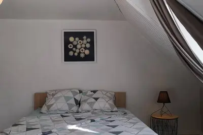 Un ou plusieurs lits dans un hébergement de l'établissement Duplex au centre ville, dans cour intérieure calme