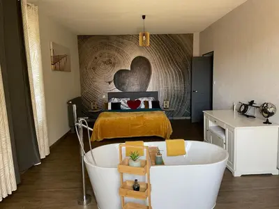 Cuisine ou kitchenette dans l'établissement Gite de l'Arboretum