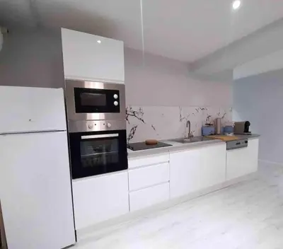 Cuisine ou kitchenette dans l'établissement Le Nuits Saint Georges