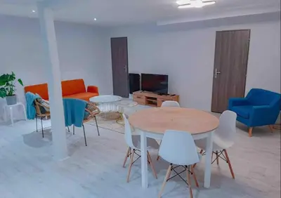 Coin salon dans l'établissement Le Nuits Saint Georges