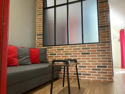 Coin salon dans l'établissement L'Aubergiste