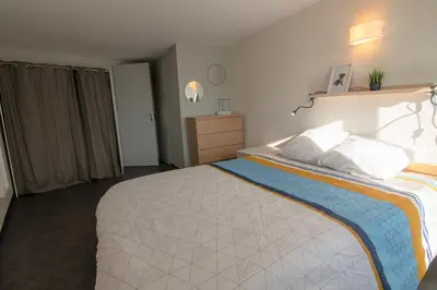 Un ou plusieurs lits dans un hébergement de l'établissement CABANA & Duplex - Cluny à 20 minutes