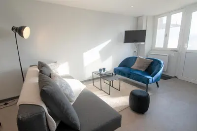 Coin salon dans l'établissement CABANA & Duplex - Cluny à 20 minutes
